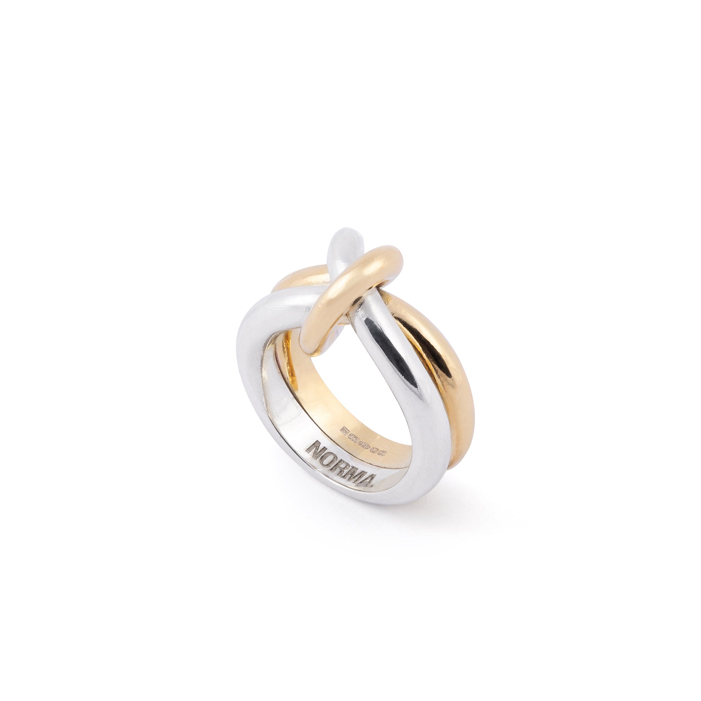 Two-toned ring with knot detail on a white background