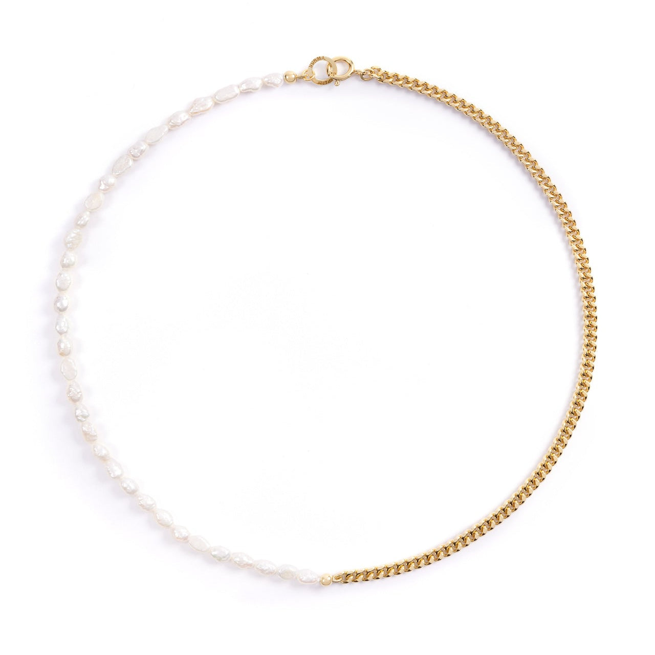 Gold chain and freshwater pearl necklace on a white background