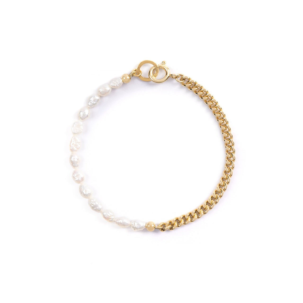 Gold chain bracelet with white pearls on a white background