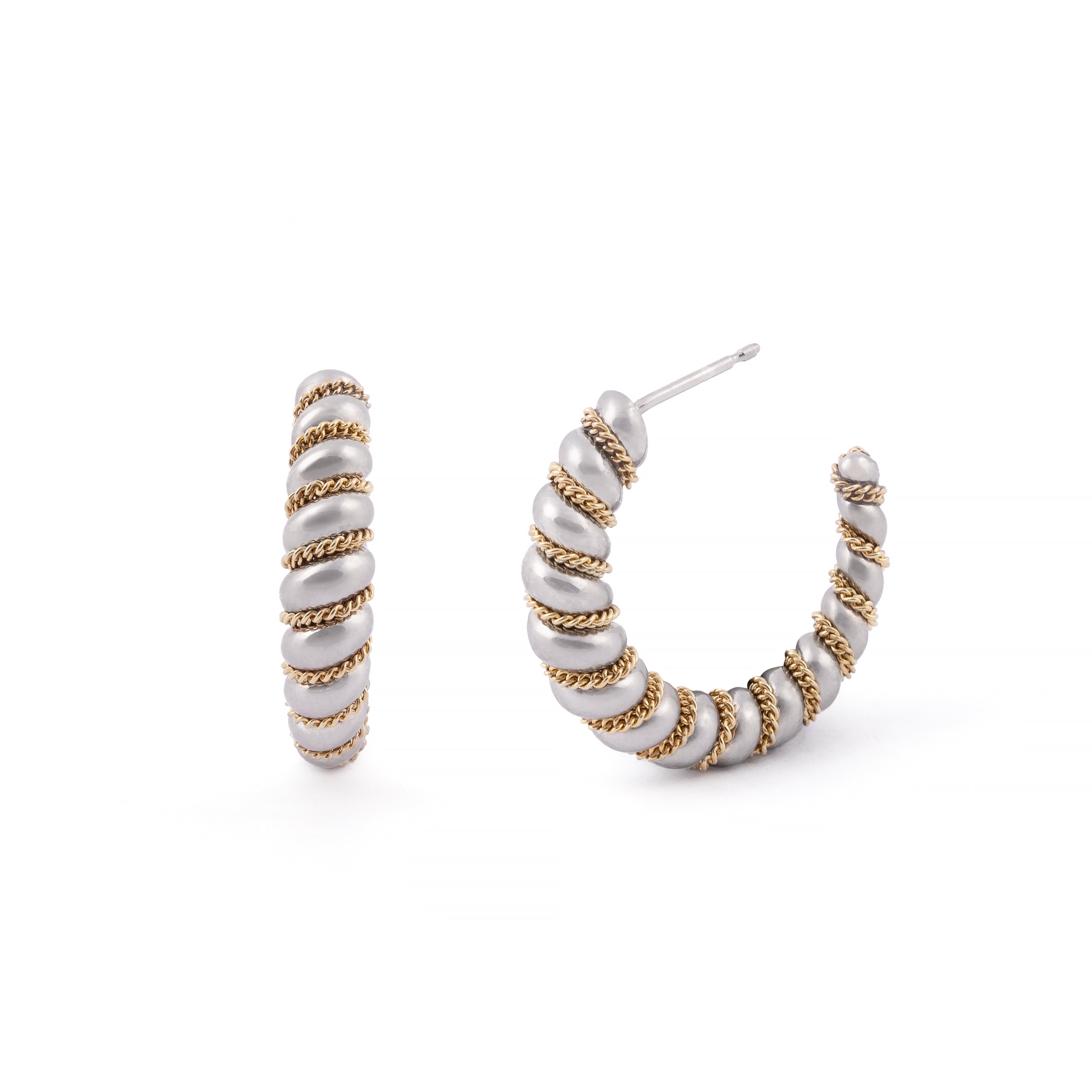 Pair of hoop earrings with spiral design on a white background