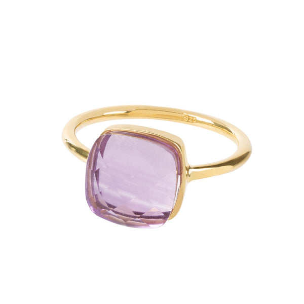 Light bounces through the facets and natural inner texture of this taper shaped and ethical amethyst gemstone. The Sophia Amethyst ring can be worn on its own or stacked with similar rings. We love the translucent glow that comes off this specimen, it really comes to life on a hand. Perfect for a lover of symmetry and balance. 