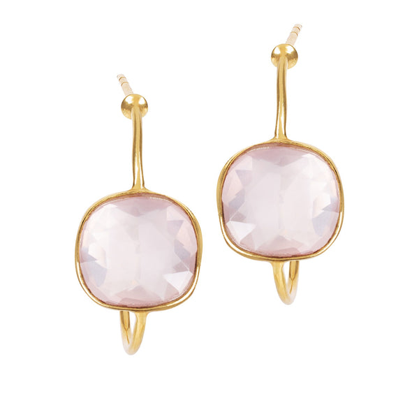 The Sophia Pink Quartz Hoop Earring features a boldly beautiful pink gemstone surrounded by gold. The stone is hand faceted and cushion cut, making these delicate earrings very wearable and ideal to add a splash of colour to any outfit. Pink Quartz is the birthstone for January and is known as the gemstone of universal love. It restores trust and harmony in relationships, encouraging unconditional love. 