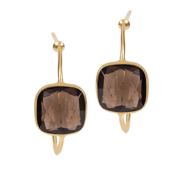 The Sophia Smokey Quartz Hoop Earring features a beautiful golden brown gemstone surrounded by 14ct gold Vermeil. The stone is hand faceted and cushion cut, making these delicate earrings very wearable and ideal to add a splash of colour to any outfit.