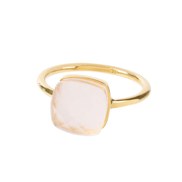 Light bounces through the facets and natural inner texture of this taper shaped rose quartz gemstone. The Sophia Rose Quartz can be worn on its own or stacked with similar rings. We love the translucent glow that comes off this specimen, it really comes to life on a hand. Perfect for a lover of symmetry and balance.