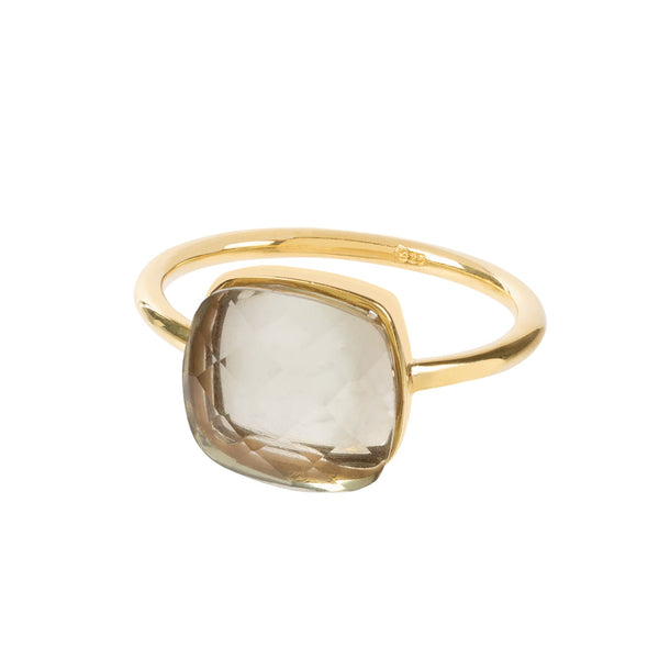 Light bounces through the facets and natural inner texture of this taper shaped Prasiolte gemstone. The Sophia Prasiolte ring can be worn on its own or stacked with similar rings. We love the translucent glow that comes off this specimen, it really comes to life on a hand. Perfect for a lover of symmetry and balance.